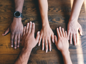 hands of different skin tones