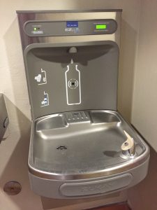 Photograph of a water bottle fountain that you can refill your own water bottle.