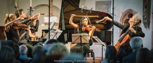 A music ensemble with two violins, a viola, and a cello.