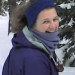 Smiling woman in snow