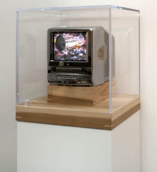 TV Set on pedestal with plexiglass case
