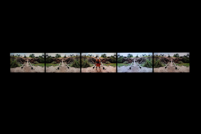 Five small screens are shown in a horizontal line, each depicts a different channel from Zina Saro-Wiwa's Karikpo Pipeline installation