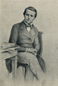 Etching of a young man dressed a la the 1800s seated beside a table.