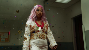 Stephanie Hsu as “Jobu Tupaki,” who appears in many different colorful costumes, pictured in a Matador’s suit of lights.