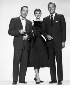 Cast stars (left to right): Humphrey Bogart, Audrey Hepburn, William Holden