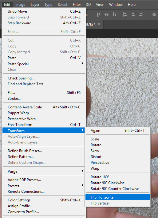 Screencapture showing the Adobe® Photoshop® Edit menu with Transform > Flip Horizontal selected.