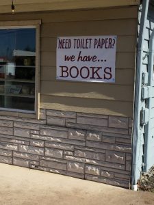 sign that says need toilet paper? we have books