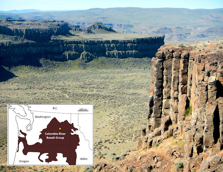 Part of the Columbia River Basalt Group at Frenchman Coulee, eastern Washington, United States. All of the flows visible here have formed large (up to two meters in diameter) columnar basalts, a result of relatively slow cooling of flows that are tens of m thick. The inset map shows the approximate extent of the 17 to 14 Ma Columbia River Basalts, with the location of the photo shown as a star.