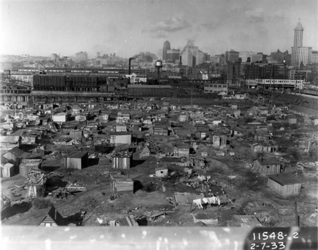 A black and white photo of a shantytown in Seattle, WA, 1933