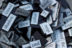 a photo of a pile of word magnets