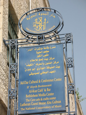 International center sign with multiple languages on it.