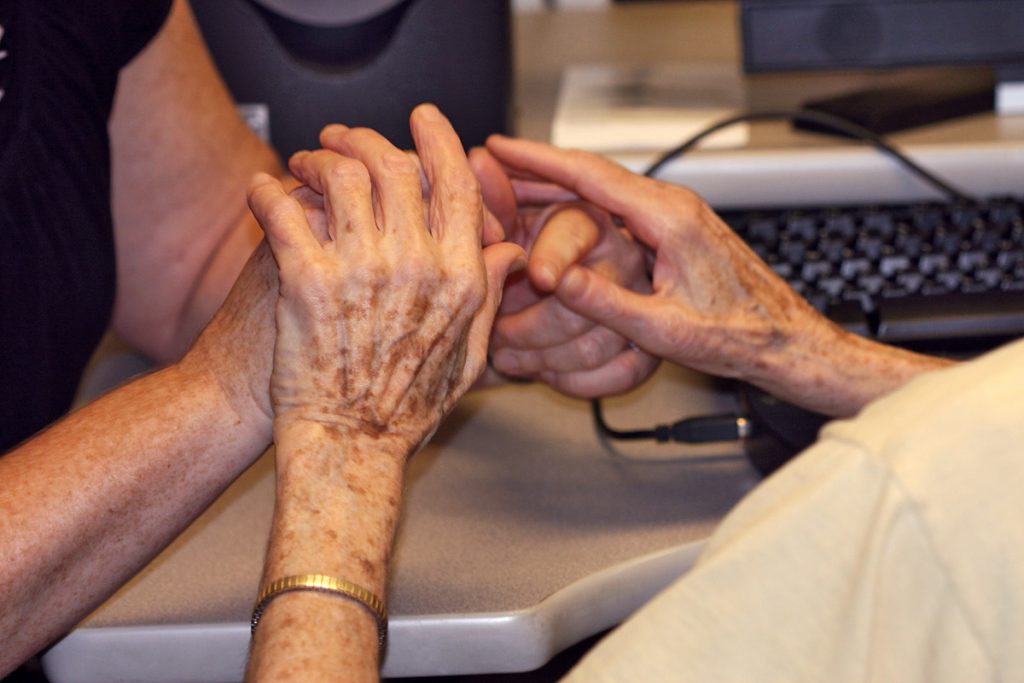 two people using their hands to communicate by touch