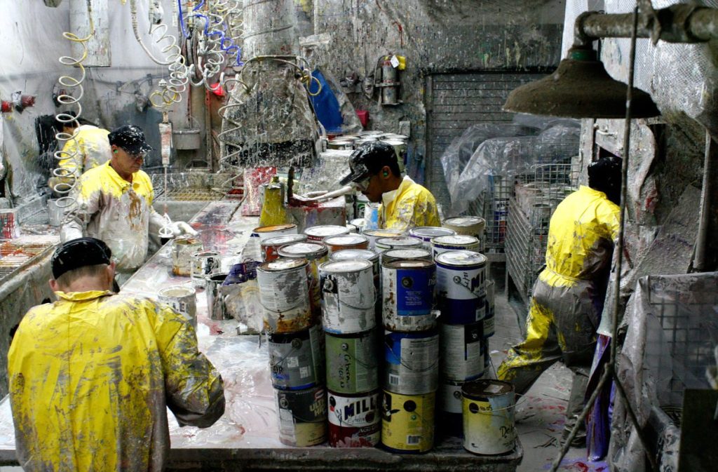 employees sort paint at Metro