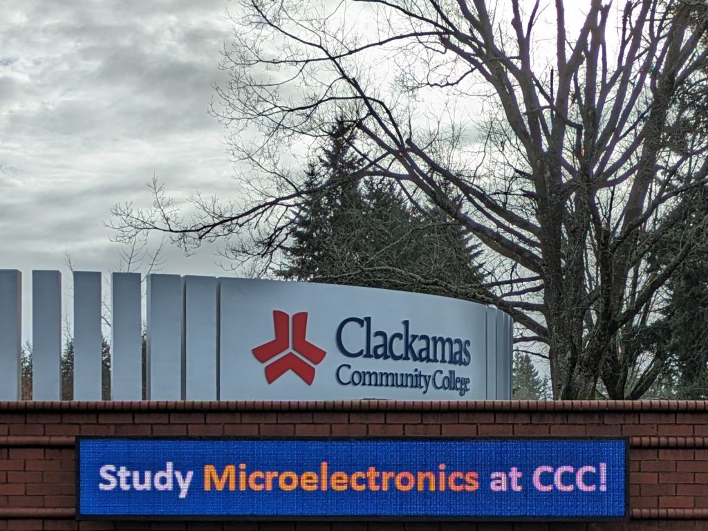 a sign advertising a college's microelectronics program