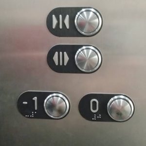 elevator buttons labeled 0 and -1