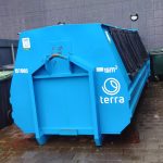 a dumpster labeled 15 cubic meters