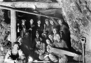 Men crowded into a mine