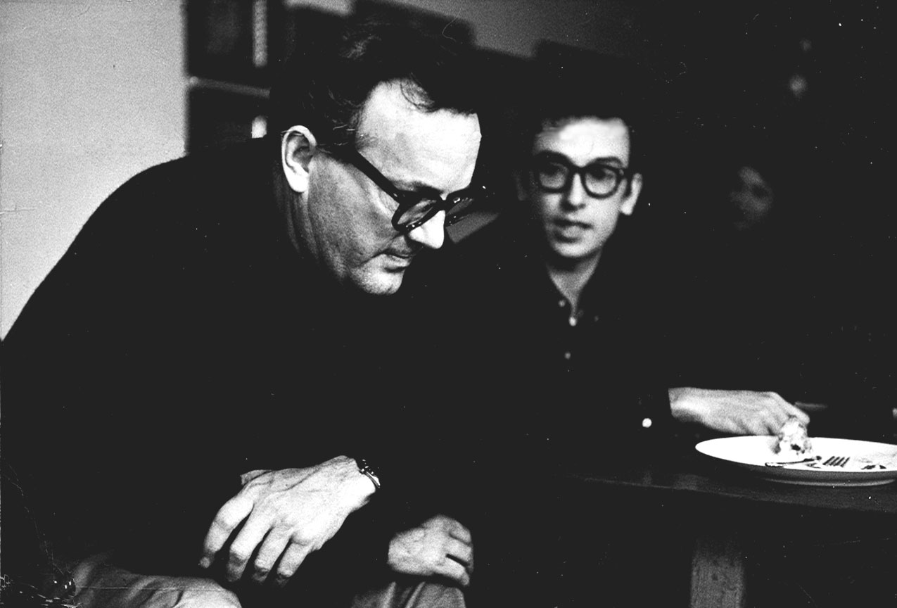 Sociologist C. Wright Mills sitting with journalist Saul Landau