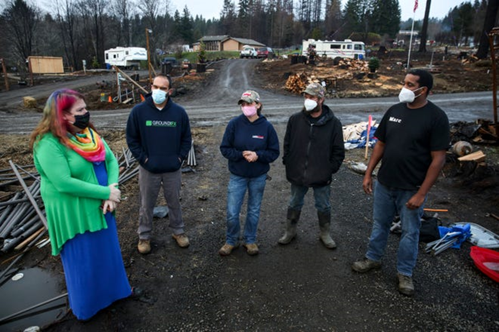 Volunteers gathered to rebuild Otis after the fire