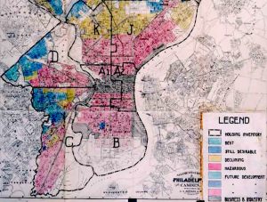 Lending institutions and the federal government created maps in which the places where people of color and/or foreign-born lived were colored red. Loan companies created redlining maps. In this one, we see parts of the map are red, others are blue or white. Each section has clearly drawn boundaries.