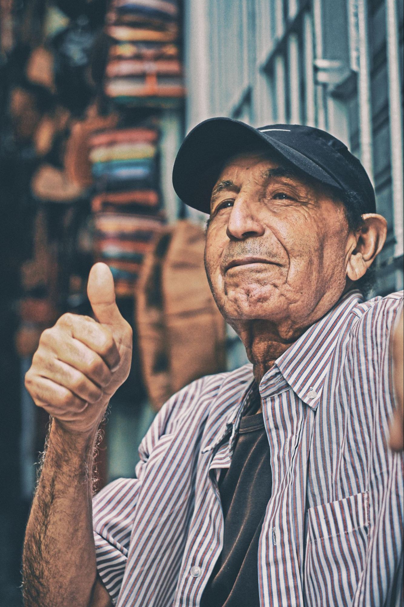Fig 1.7 A person is giving a thumbs up.