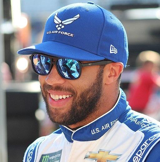 Light skinned black man, face only with sunglasses and sports cap