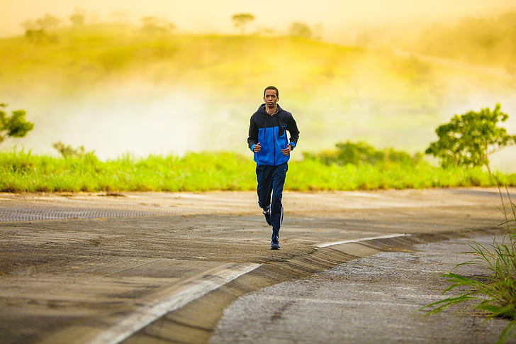 A person running outside alone.