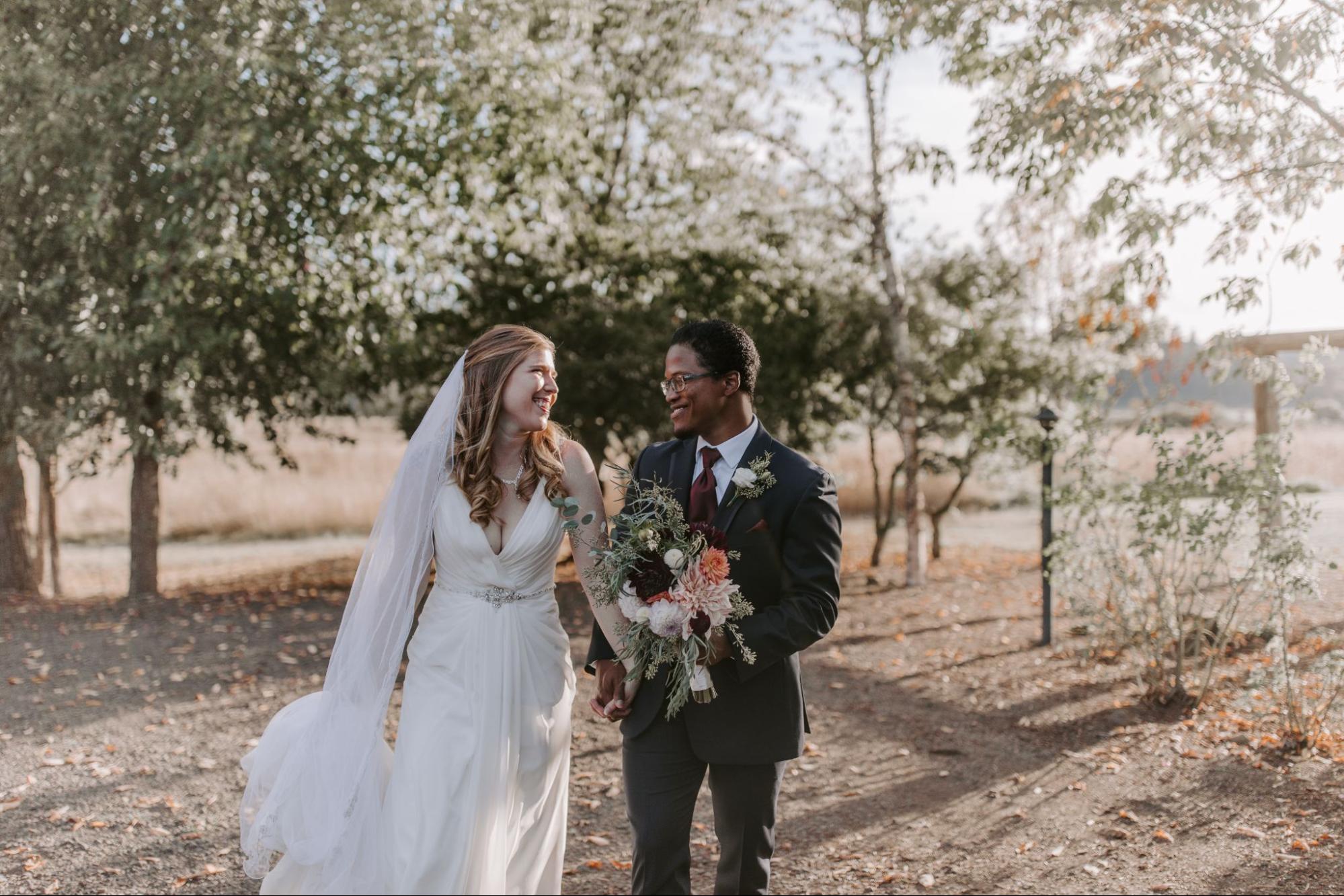 Interracial married couple, woman and man.