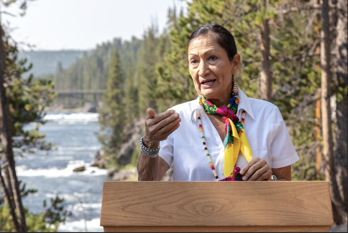 Deb Haaland at an outdoor lectern