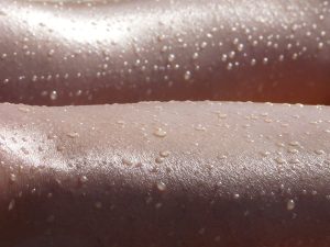 water drops beaded on skin