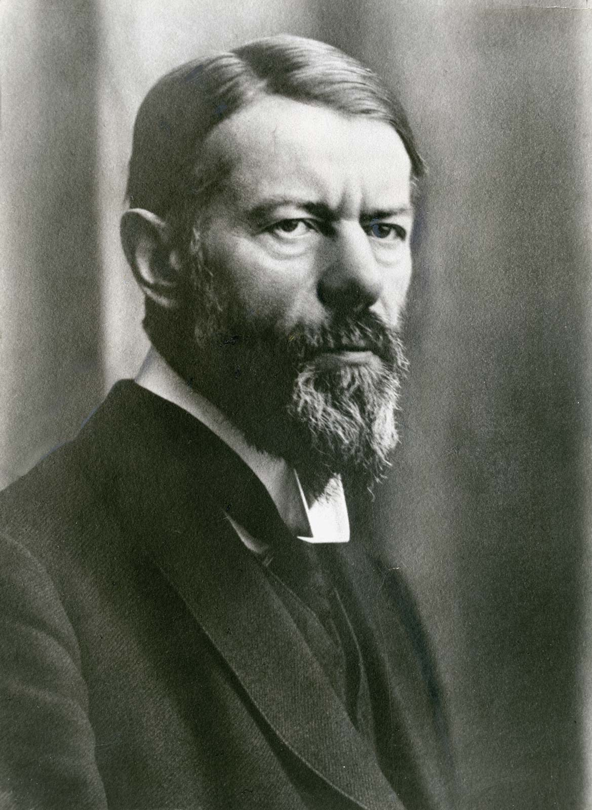 Portrait of Max Weber, a white man with a beard, wearing a black suit.