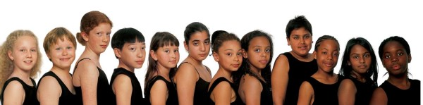 A line of feminine-presenting children with skin tones that gradually progress from pale tones to medium tones to darker tones.