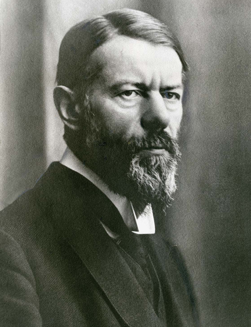 Portrait of Max Weber, a white man with a beard, wearing a black suit.