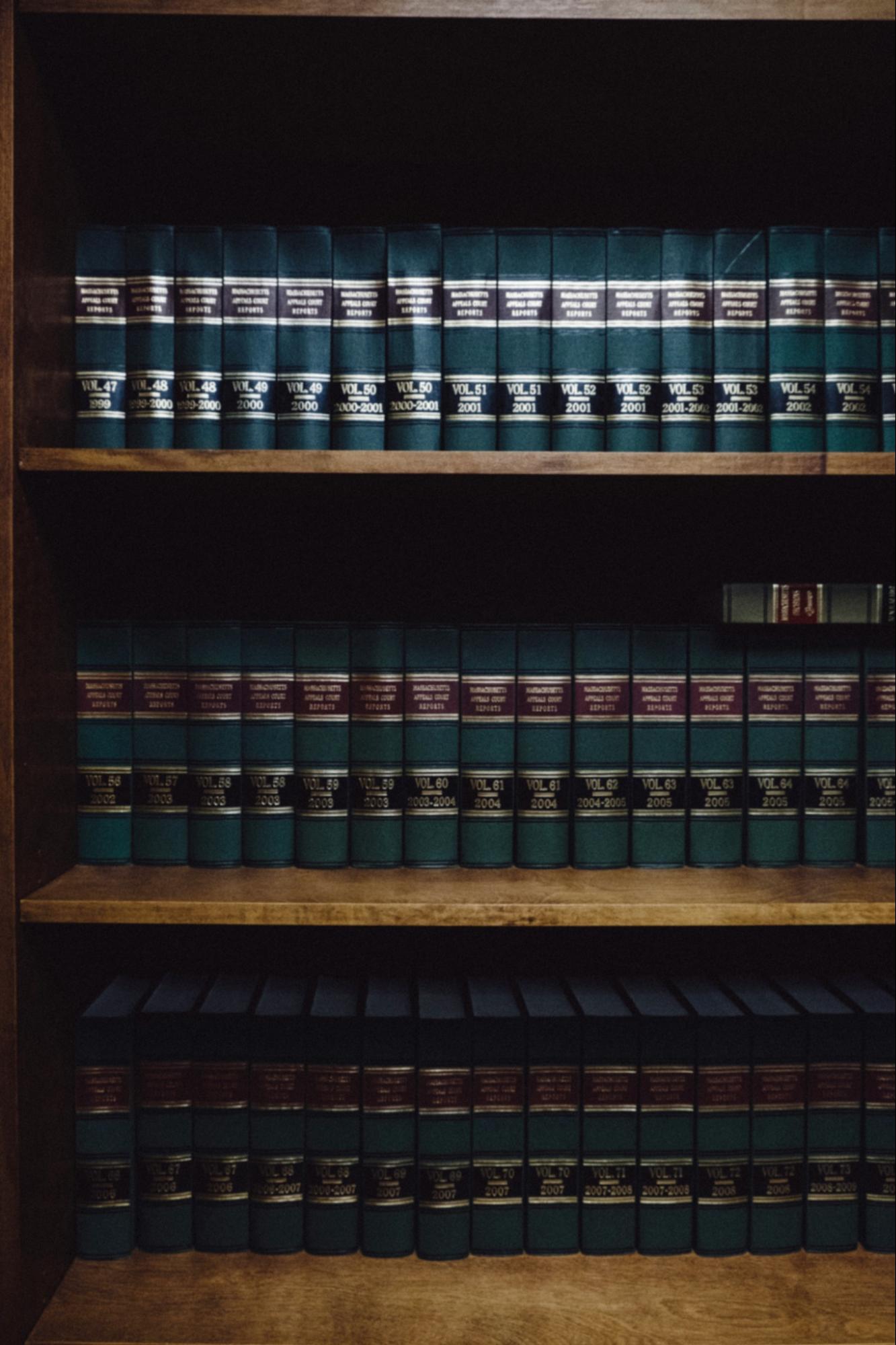 Bookshelf holding a set of legal books