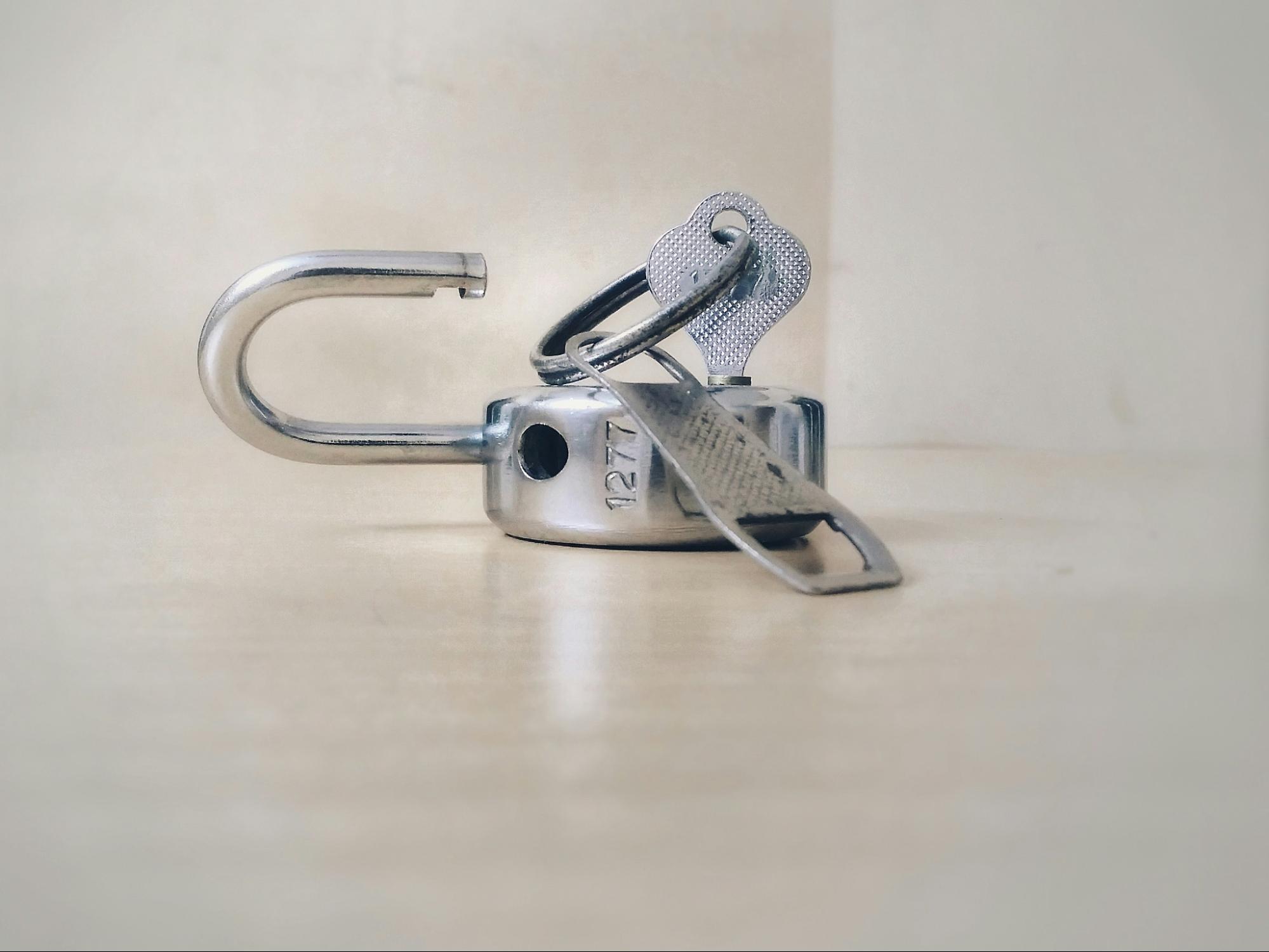 A padlock with a key in it