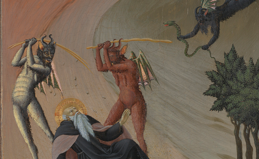 An old painting of a man depicted as holy wearing a black robe, long white beard, and halo around his head. Three demons depicted as human-like beings with wings, horns, and talons are beating the holy man with a stick and threatening him with a snake. A church can be seen in the background up the road.