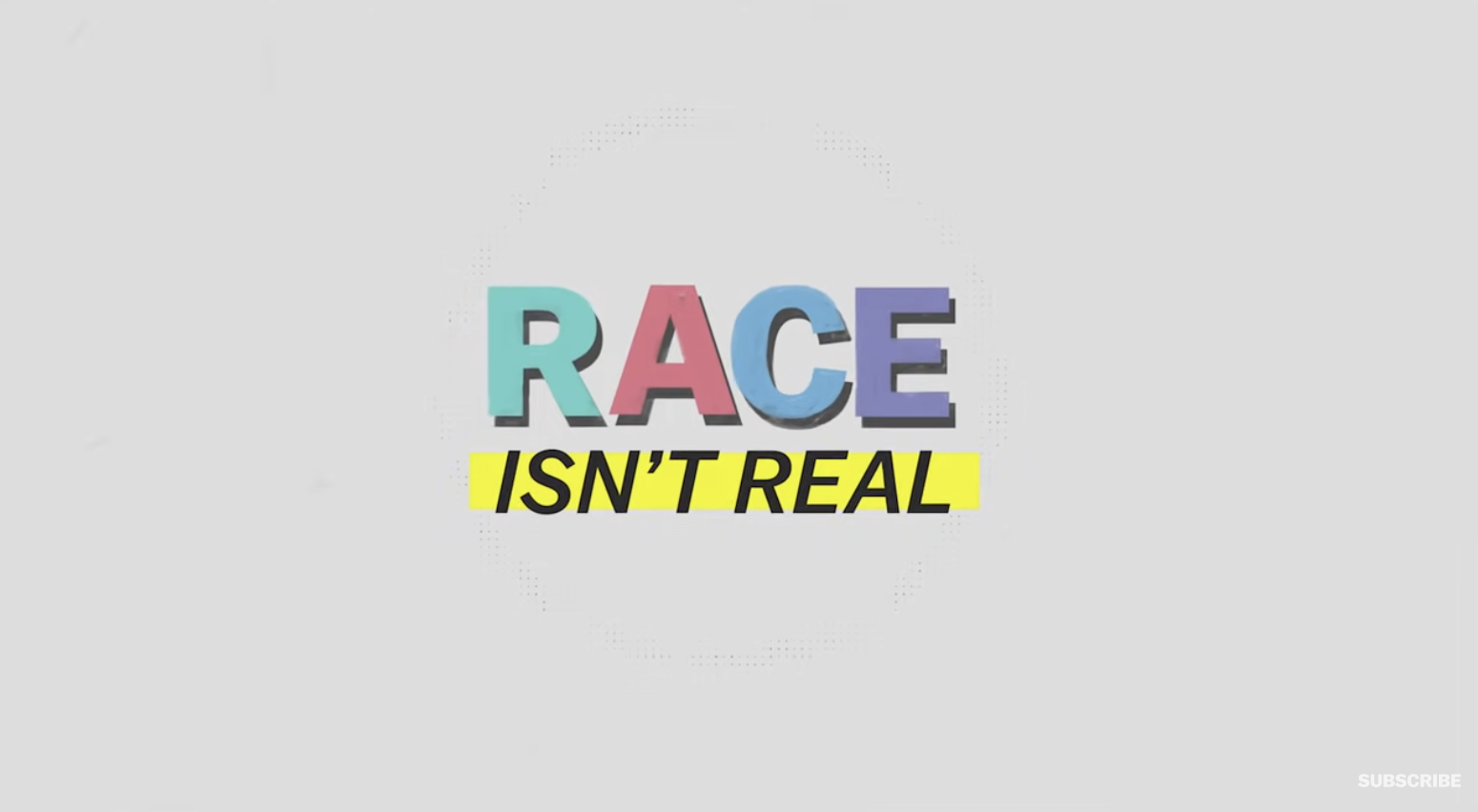 Image that reads, "Race isn't Real" in color.