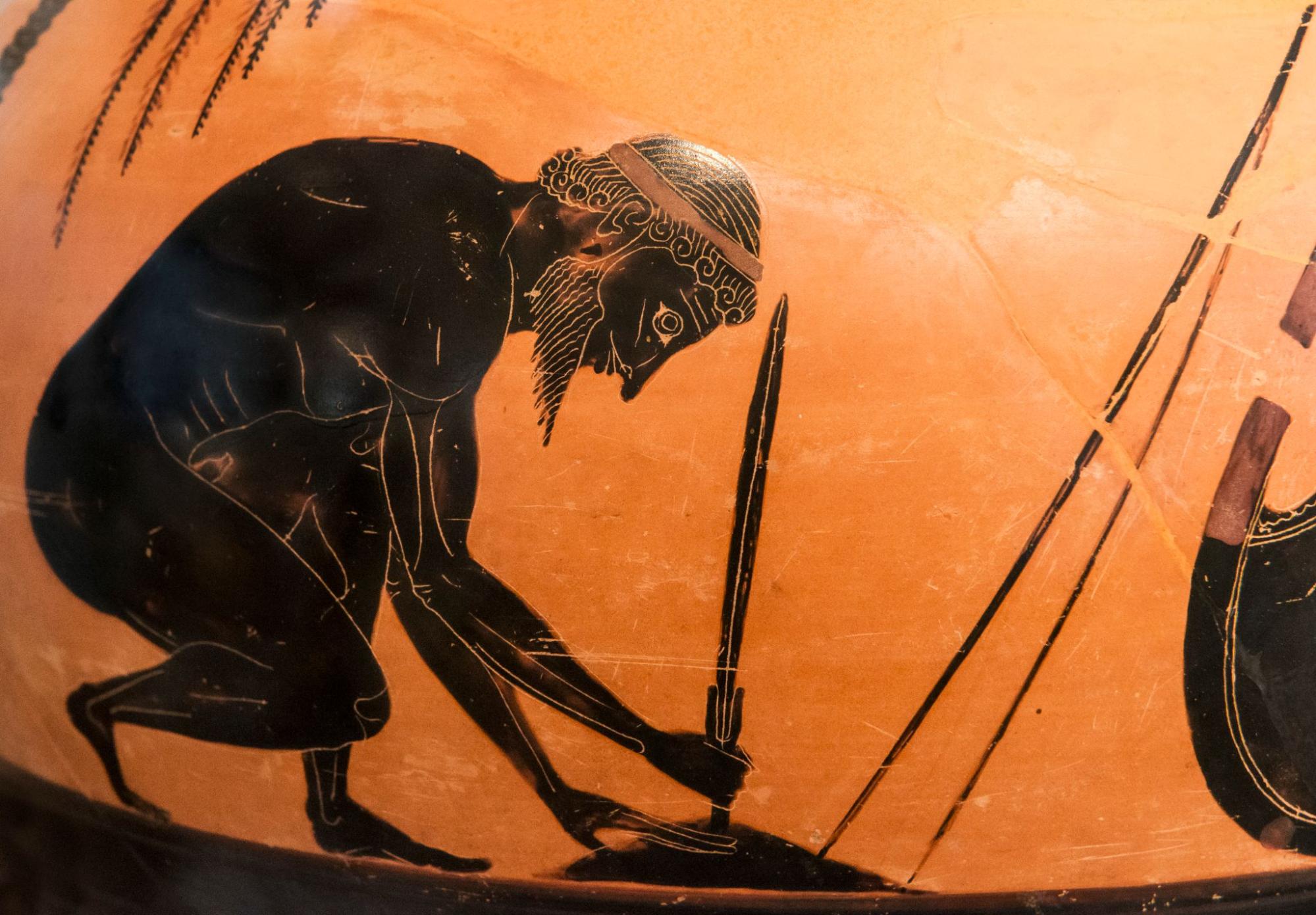 A painting on a vase that shows a man burying a sword in the ground with the sharp end pointing up.