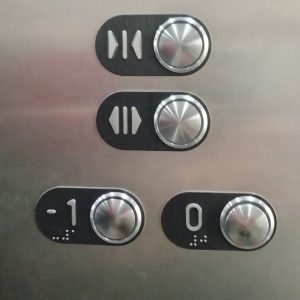 elevator buttons labeled 0 and −1