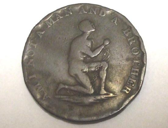 A coin with the inscription Am I not a man and a brother?