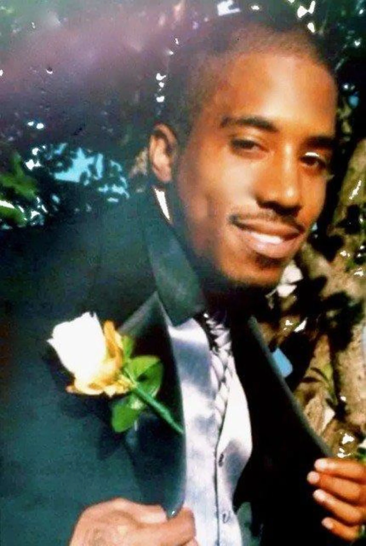 A school photo of Dontre Hamilton, possibly at prom.