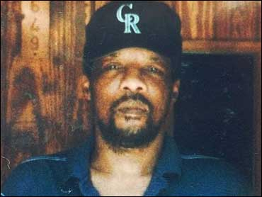 A photo of James Byrd Jr. wearing a baseball cap