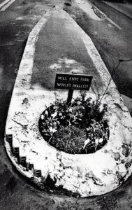 small circular Mill Ends Park in traffic island