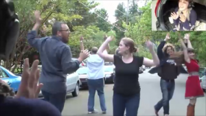 people dancing in the street