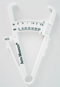 A pair of plastic rods connected by a hinge at one end, with pads on the open ends designed to pinch a fold of skin. A scale on the devise indicates the thickness of the pinched fold.
